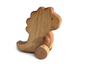 Handgefertigter Schiebe - Dino auf Rädern, Ahorn geölt