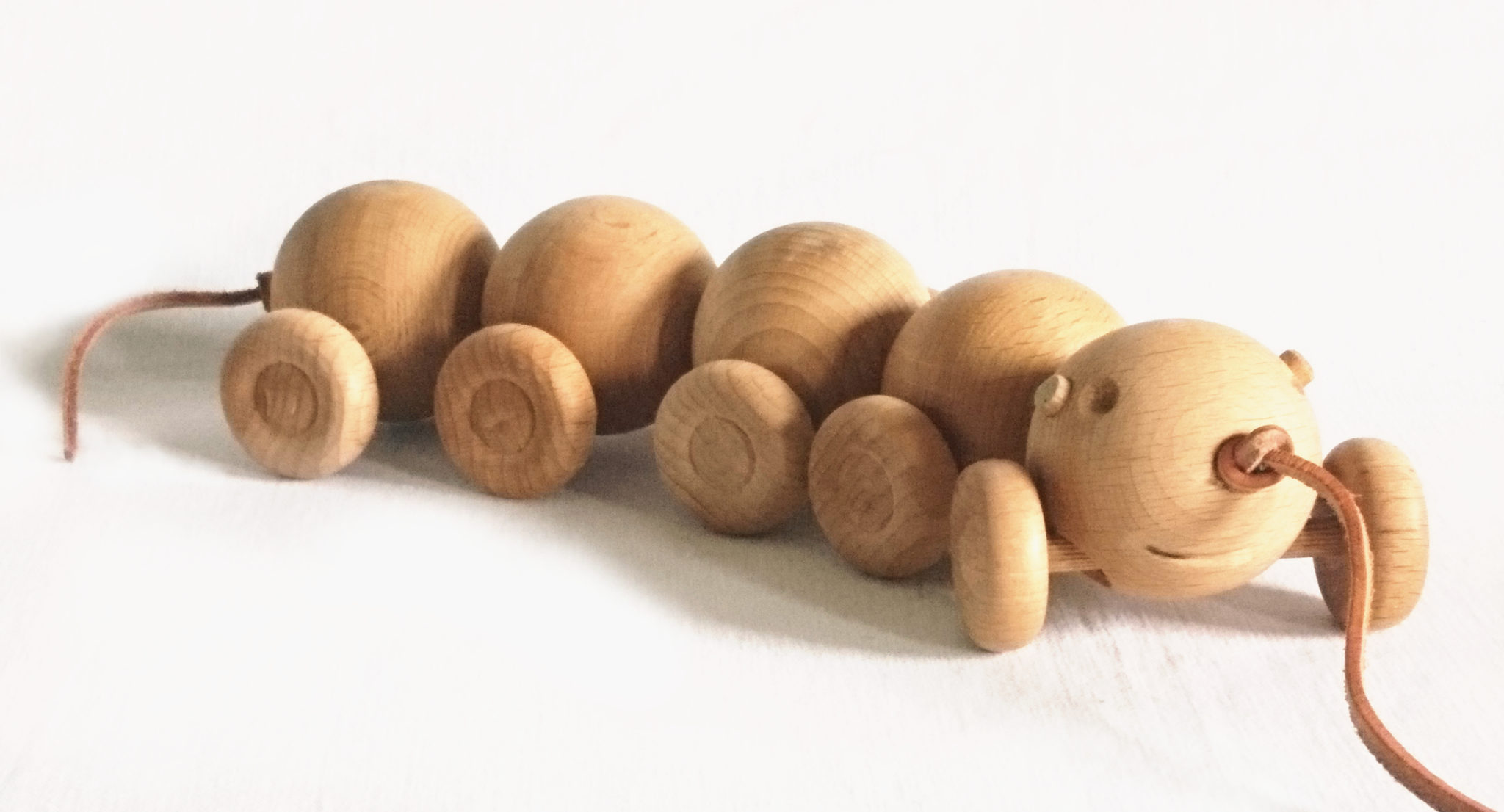 Raupe Buche geölt, mit Lederband