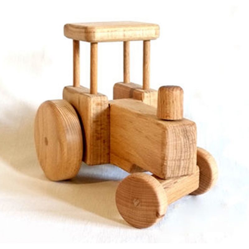 Trecker aus Buchenholz mit einer lenkbaren Vorderachse das Holzspielzeug ist mit Biologischen Leinöl behandelt